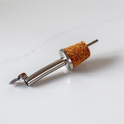 Cork and metal oil pourer