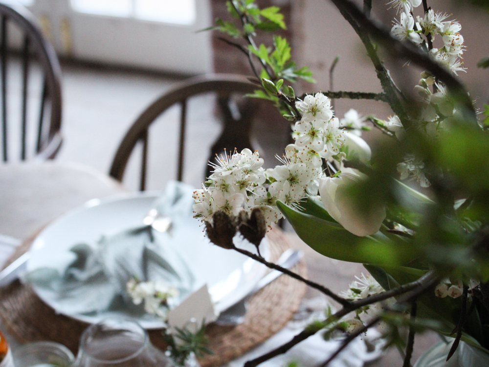Blossom and hedgerow twigs in a vase