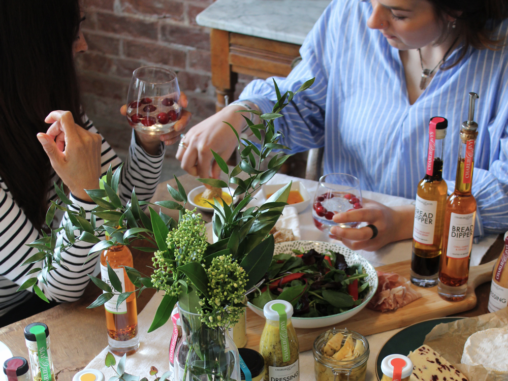 People grazing at a spring table