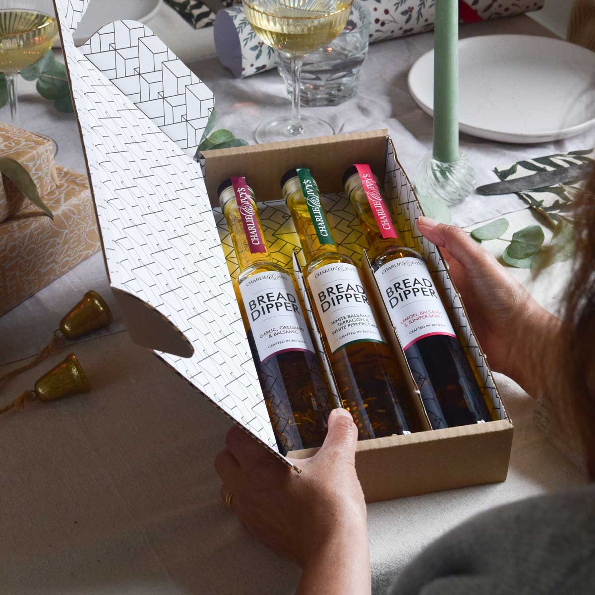 Trio of Dippers Gift Set being held at the Christmas table
