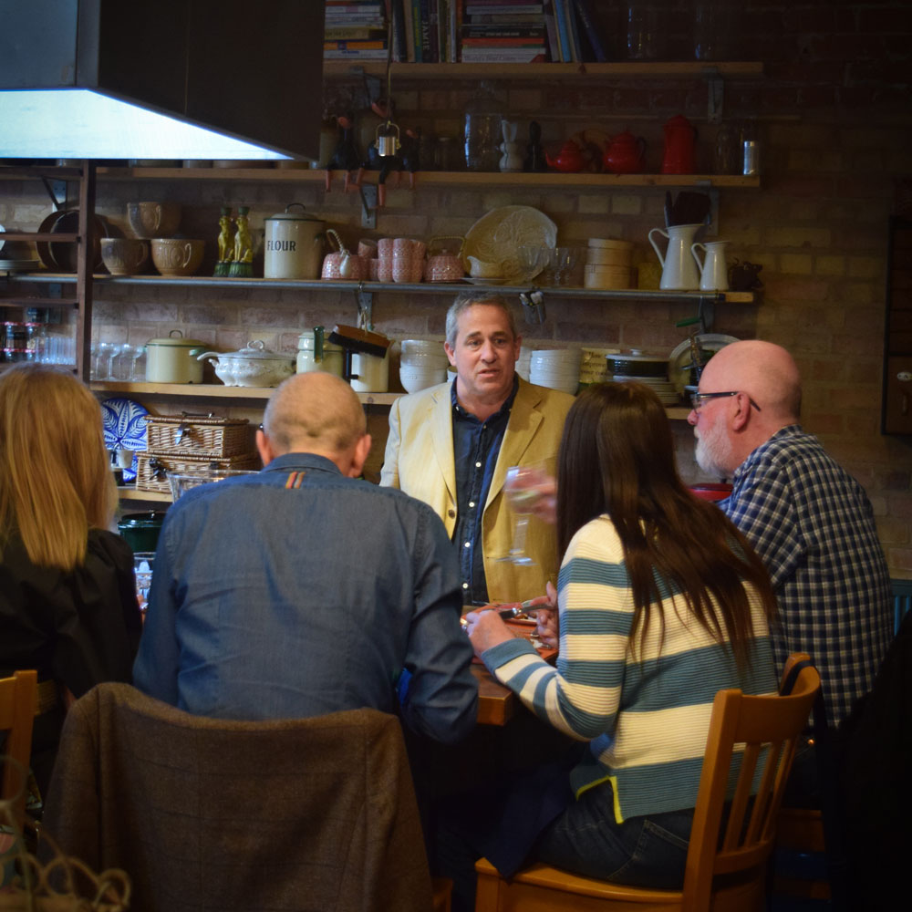 Justin Staal talking to guests at the Supper Club